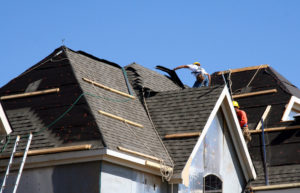 roofers in action on colorado large roof project