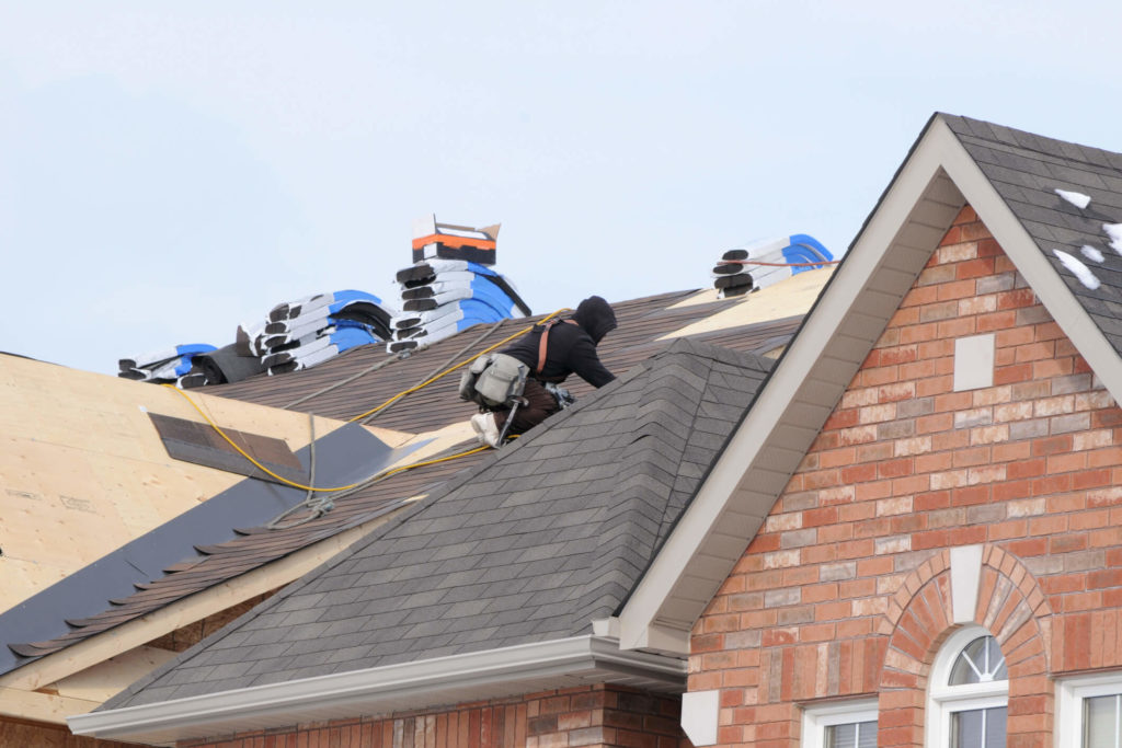 storm protection roofing team on colorado home roof